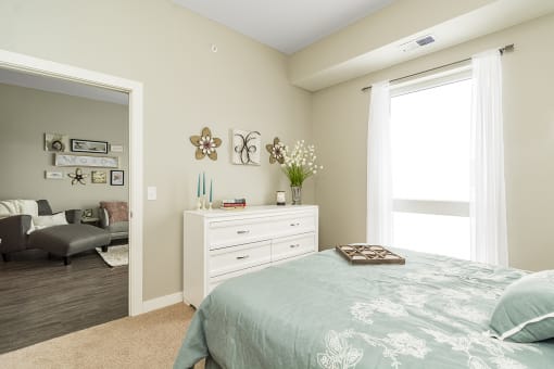 One and two bedroom hi-end apartment homes featuring Energy-Efficient Stainless Steel Appliances,  Granite Kitchen Island, dark cabinets, and much more at The Nexus at Gray's Landing in Downtown Des Moines, IA