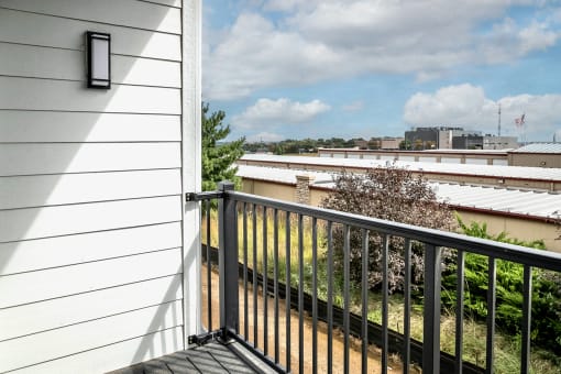 Studio, one and two bedroom apartment homes featuring stainless steel appliances, luxury vinyl floor, granite countertops, large closets and full-size washer and dryer at The Parker in Papillion, NE