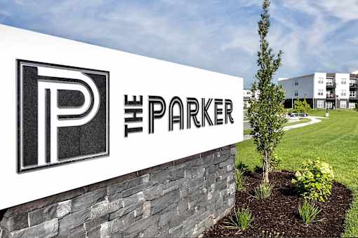 The Parker sign is displayed on a stone wall.