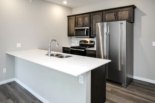 Brand new one, two and three bedroom apartment homes, featuring stainless steel appliances, vinyl plank flooring, carpeting, and more at Prairie Park Apartments in Wayne, NE