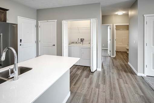 Modern kitchen with stainless steel appliances at Logan Creek Apartments in Wakefield, NE