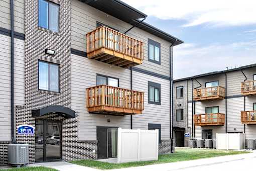 Property Exterior with Patio and Balconies at Residences at Oak Pointe in Grand Island, NE