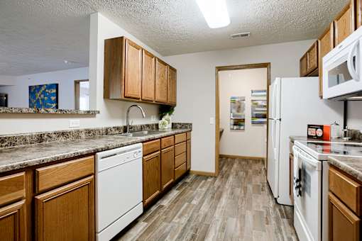 One and two-bedroom apartment homes featuring efficient appliances, patios and balconies, vaulted ceilings and more at Standing Bear Apartments in Omaha, NE