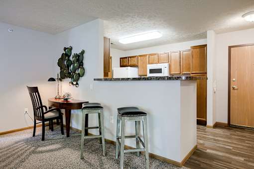One and two-bedroom apartment homes featuring efficient appliances, patios and balconies, vaulted ceilings and more at Standing Bear Apartments in Omaha, NE
