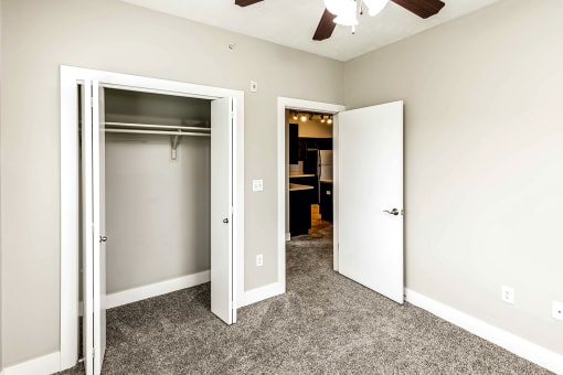 Bedroom with a closet at Tamarin Ridge in Lincoln, NE