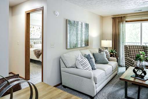 One- two- and three-bedroom apartment homes featuring amenities like three pools, fitness center, basketball court and much more at The Pointe in La Vista, NE