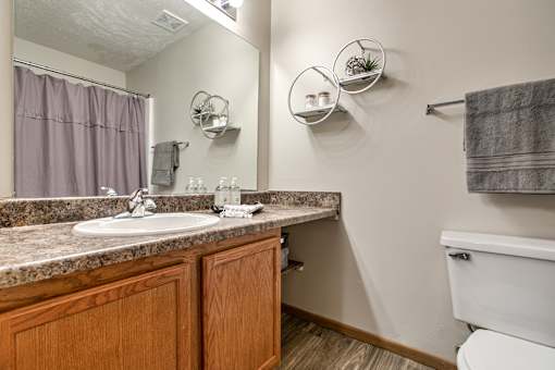 One two and three-bedroom apartment homes featuring amenities like three pools, fitness center, basketball court and much more at The Pointe in La Vista, NE