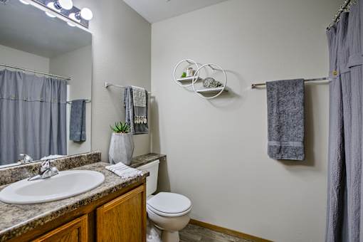 One two and three-bedroom apartment homes featuring amenities like three pools, fitness center, basketball court and much more at The Pointe in La Vista, NE