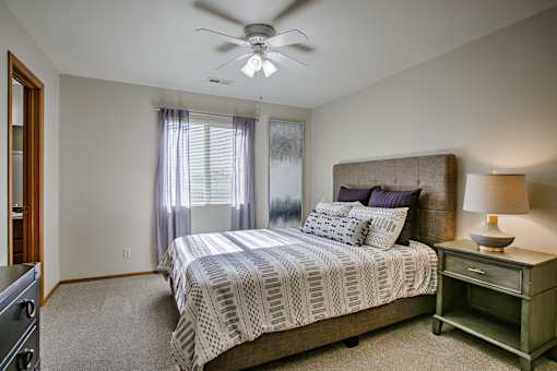 One two and three-bedroom apartment homes featuring amenities like three pools, fitness center, basketball court and much more at The Pointe in La Vista, NE