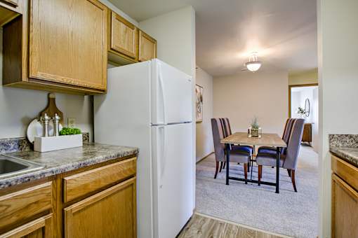 One two and three-bedroom apartment homes featuring amenities like three pools, fitness center, basketball court and much more at The Pointe in La Vista, NE