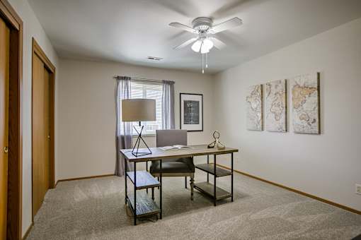 One two and three-bedroom apartment homes featuring amenities like three pools, fitness center, basketball court and much more at The Pointe in La Vista, NE
