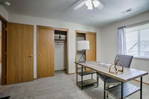 One two and three-bedroom apartment homes featuring amenities like three pools, fitness center, basketball court and much more at The Pointe in La Vista, NE