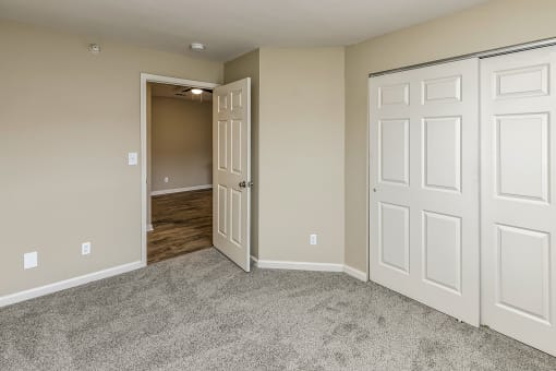 Bedroom with closet at The Vue Apartments, Bellevue, NE 68123