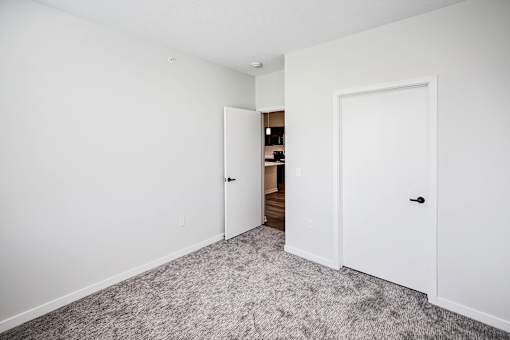 Studio, one two and three bedroom apartments and townhomes featuring open concept floor plans, dens, large windows, stainless steel appliances, quartz countertops, eat-in kitchens, pantries, LVT flooring and much more at The Trails at North Streams in Omaha, NE