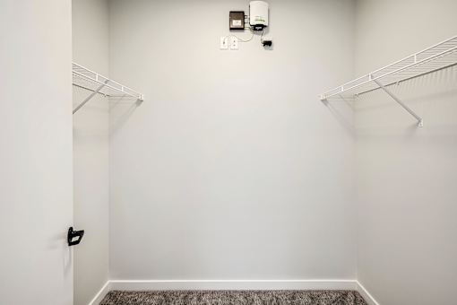 Studio, one two and three bedroom apartments and townhomes featuring open concept floor plans, dens, large windows, stainless steel appliances, quartz countertops, eat-in kitchens, pantries, LVT flooring and much more at The Trails at North Streams in Omaha, NE