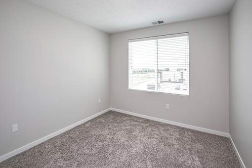 Studio, one two and three bedroom apartments and townhomes featuring open concept floor plans, dens, large windows, stainless steel appliances, quartz countertops, eat-in kitchens, pantries, LVT flooring and much more at The Trails at North Streams in Omaha, NE