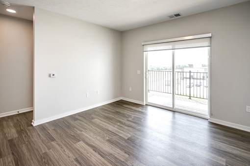 Studio, one two and three bedroom apartments and townhomes featuring open concept floor plans, dens, large windows, stainless steel appliances, quartz countertops, eat-in kitchens, pantries, LVT flooring and much more at The Trails at North Streams in Omaha, NE