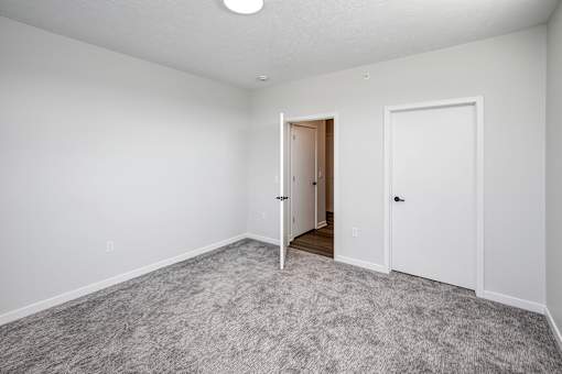 Studio, one two and three bedroom apartments and townhomes featuring open concept floor plans, dens, large windows, stainless steel appliances, quartz countertops, eat-in kitchens, pantries, LVT flooring and much more at The Trails at North Streams in Omaha, NE