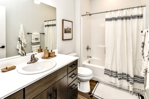 Studio, one two and three bedroom apartments and townhomes featuring open concept floor plans, dens, large windows, stainless steel appliances, quartz countertops, eat-in kitchens, pantries, LVT flooring and much more at The Trails at North Streams in Omaha, NE