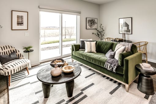 Studio, one two and three bedroom apartments and townhomes featuring open concept floor plans, dens, large windows, stainless steel appliances, quartz countertops, eat-in kitchens, pantries, LVT flooring and much more at The Trails at North Streams in Omaha, NE