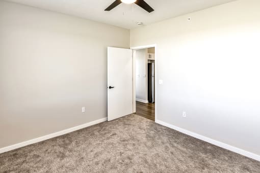 Studio, one two and three bedroom apartments and townhomes featuring open concept floor plans, dens, large windows, stainless steel appliances, quartz countertops, eat-in kitchens, pantries, LVT flooring and much more at The Trails at North Streams in Omaha, NE