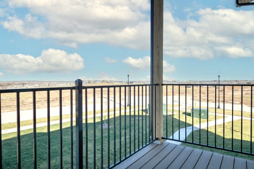 Balcony with tranquil view at the Trails at North Streams in Omaha, NE