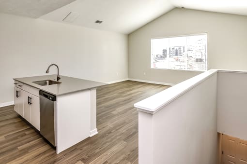 Studio, one two and three bedroom apartments and townhomes featuring open concept floor plans, dens, large windows, stainless steel appliances, quartz countertops, eat-in kitchens, pantries, LVT flooring and much more at The Trails at North Streams in Omaha, NE