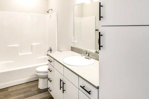 Studio, one two and three bedroom apartments and townhomes featuring open concept floor plans, dens, large windows, stainless steel appliances, quartz countertops, eat-in kitchens, pantries, LVT flooring and much more at The Trails at North Streams in Omaha, NE
