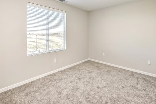 Studio, one two and three bedroom apartments and townhomes featuring open concept floor plans, dens, large windows, stainless steel appliances, quartz countertops, eat-in kitchens, pantries, LVT flooring and much more at The Trails at North Streams in Omaha, NE