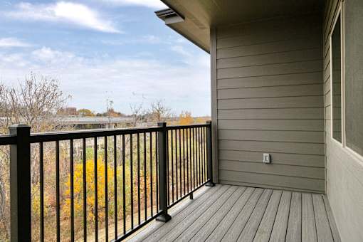 Studio, one two and three bedroom apartment homes featuring stainless steel appliances, luxury wood-style plank flooring, and in-unit washer and dryer in VUE 156 in Omaha, NE