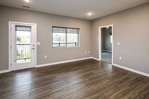 Studio, one two and three bedroom apartment homes featuring stainless steel appliances, luxury wood-style plank flooring, and in-unit washer and dryer in VUE 156 in Omaha, NE