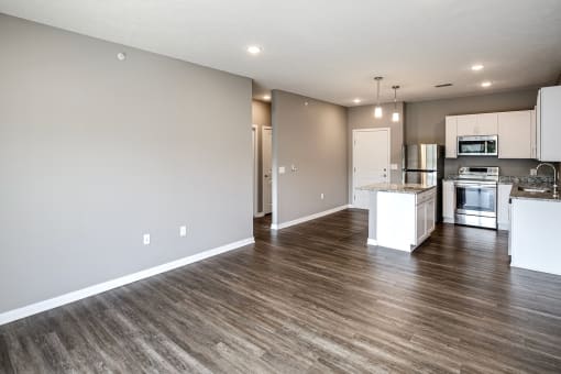 Studio, one two and three bedroom apartment homes featuring stainless steel appliances, luxury wood-style plank flooring, and in-unit washer and dryer in VUE 156 in Omaha, NE