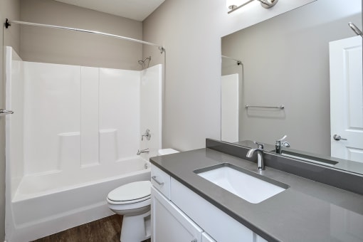 Studio, one two and three bedroom apartment homes featuring stainless steel appliances, luxury wood-style plank flooring, and in-unit washer and dryer in VUE 156 in Omaha, NE