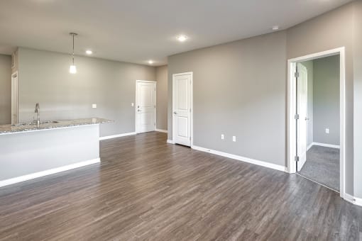 Studio, one two and three bedroom apartment homes featuring stainless steel appliances, luxury wood-style plank flooring, and in-unit washer and dryer in VUE 156 in Omaha, NE