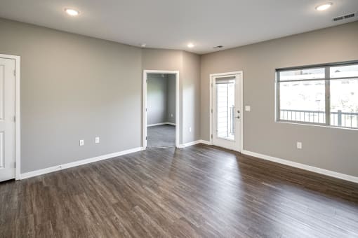 Studio, one two and three bedroom apartment homes featuring stainless steel appliances, luxury wood-style plank flooring, and in-unit washer and dryer in VUE 156 in Omaha, NE