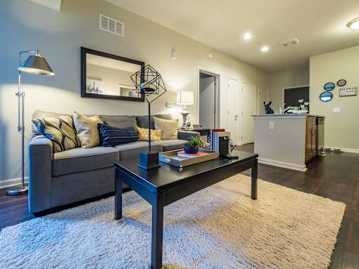 a living room with a couch and a coffee table