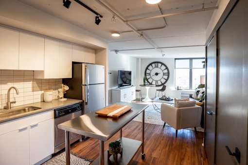 A modern kitchen with a table and chairs in the living room at Cityplace Apartment Homes Apartments, Pennsylvania