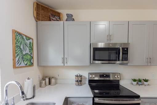 Kitchen with wooden closet and stainless steel appliances at Saucon View Apartments, Bethlehem, 18015