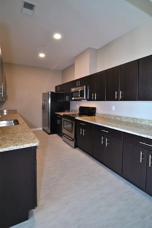 Kitchen at Living room at Southfield MI Apartments | 42 West Apartments in Southfield Michigan