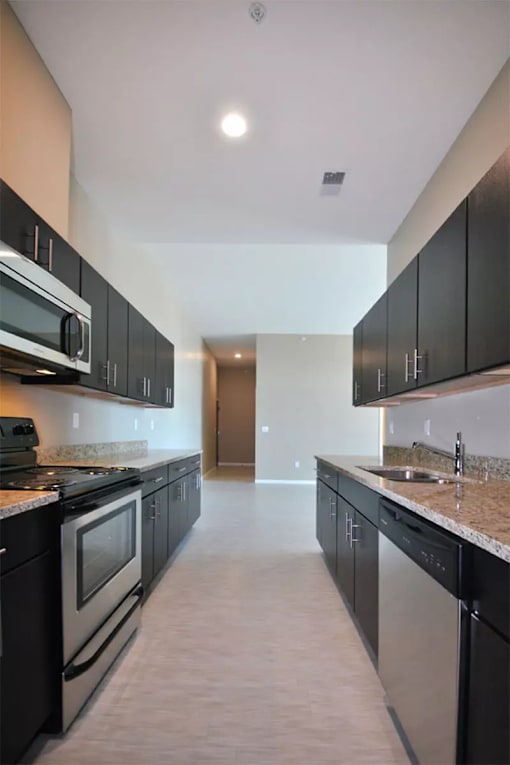 Kitchen at Living room at Southfield MI Apartments | 42 West Apartments in Southfield Michigan