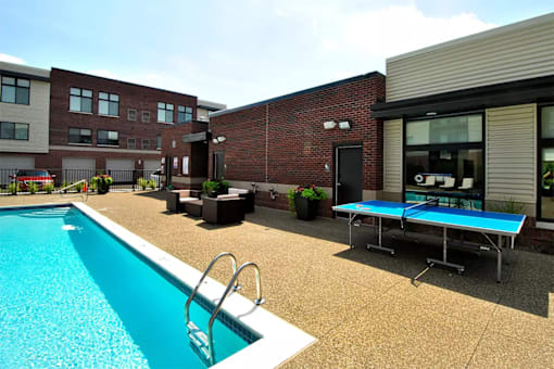Swimming pool at Living room at Southfield MI Apartments | 42 West Apartments in Southfield Michigan