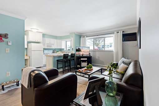 Spacious living area and kitchen at Abbott Pointe Apartments in East Lansing, MI near Michigan State University