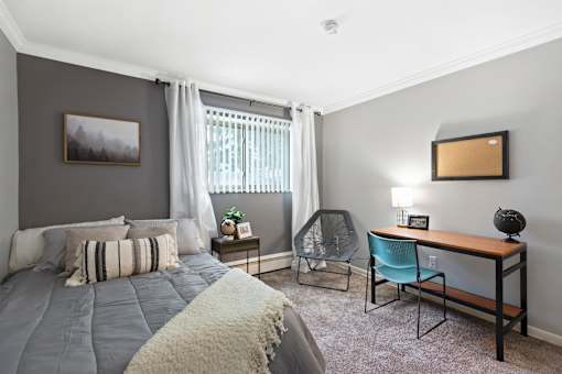 Spacious bedroom  at Abbott Pointe Apartments in East Lansing, MI near Michigan State University