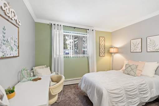 Spacious bedroom  at Abbott Pointe Apartments in East Lansing, MI near Michigan State University