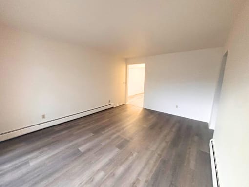 Lansing Apartments living room with vinyl plank floor