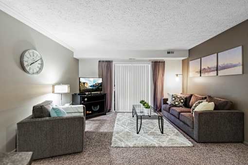 Spacious living room at Arbor Glen Apartments in East Lansing, MI near Michigan State University.