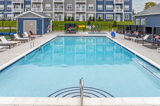 Pool, hot tub and pool deck at apartments in Traverse City | Bayview of Traverse City