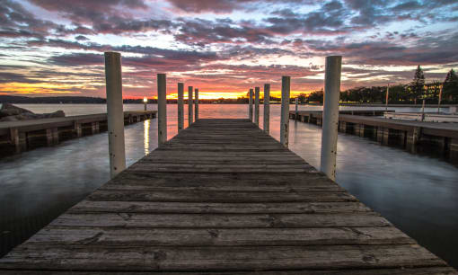 Dock and beach near apartments in Traverse City | Bayview of Traverse City