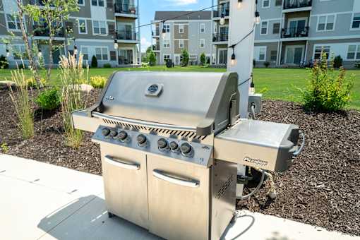 Grill stations available at Hudsonville, MI Apartments and Townehomes | Elmwood Lake Apartments in Hudsonville MI