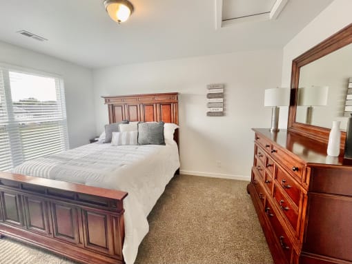 Bedroom in townhome at Elmwood Lake Apartments in Hudsonville MI